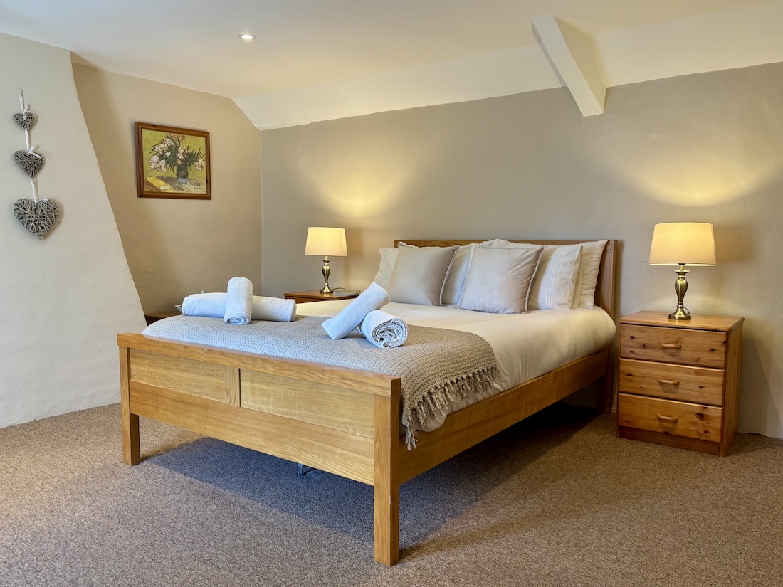 Spacious bedroom with a double bed
